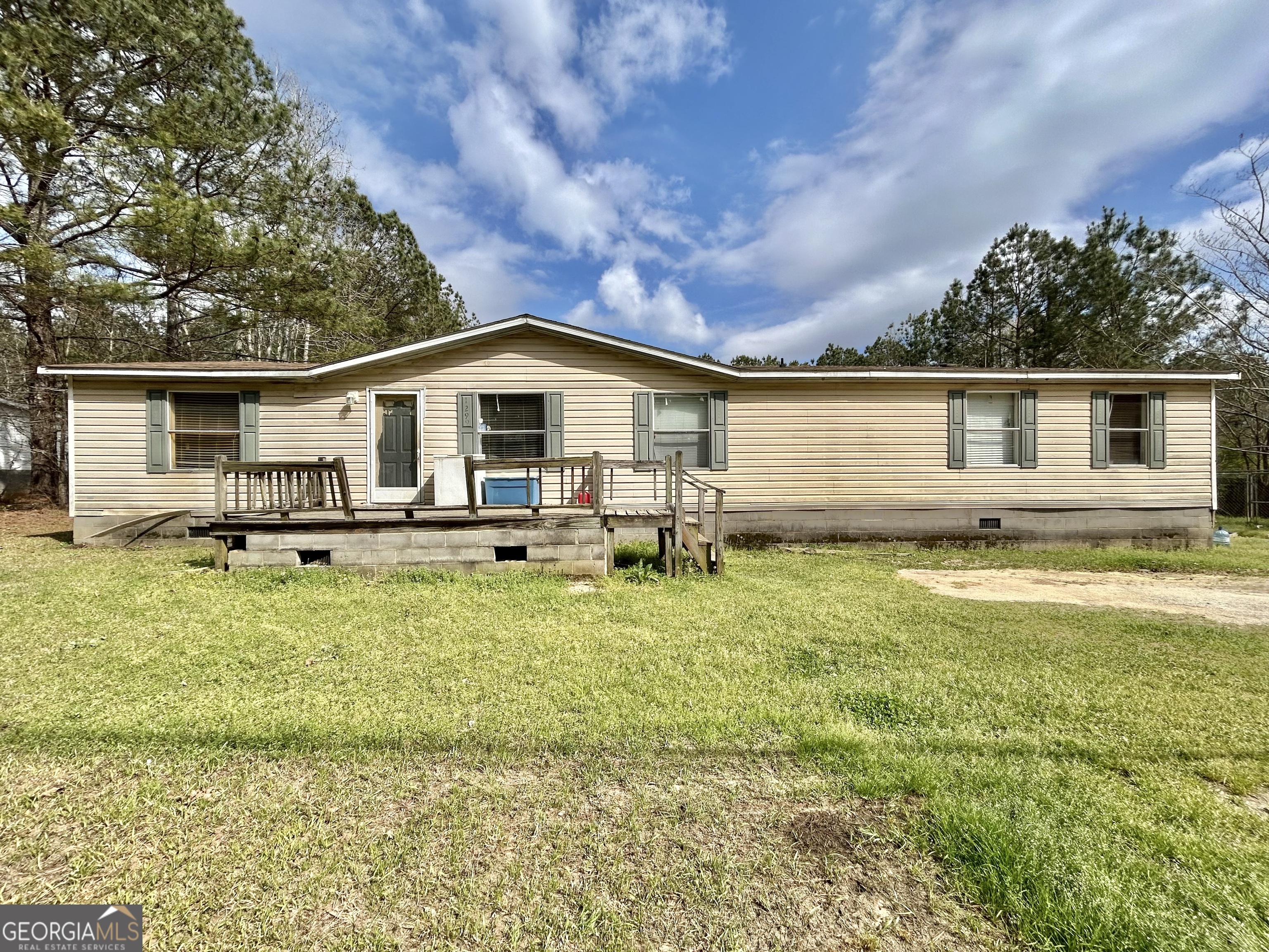 1299 Bodie Rayle Road Elberton, GA 30635 - Photo 1 of 18 a front view of house with yard and seating area
