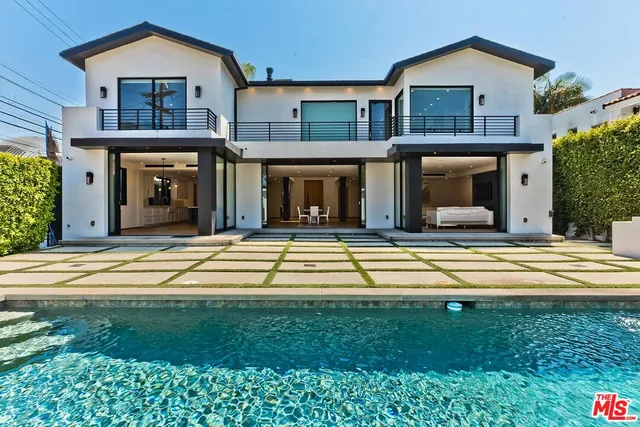 a view of a house with a swimming pool