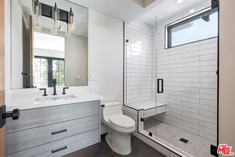 a view of a backyard with sitting area