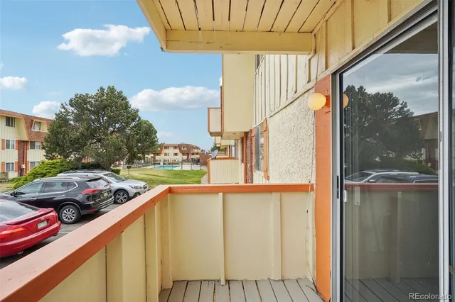 a view of a street from a balcony