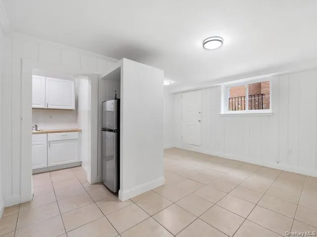 a view of a kitchen with a sink