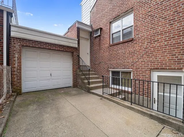 a view of a house with a garage