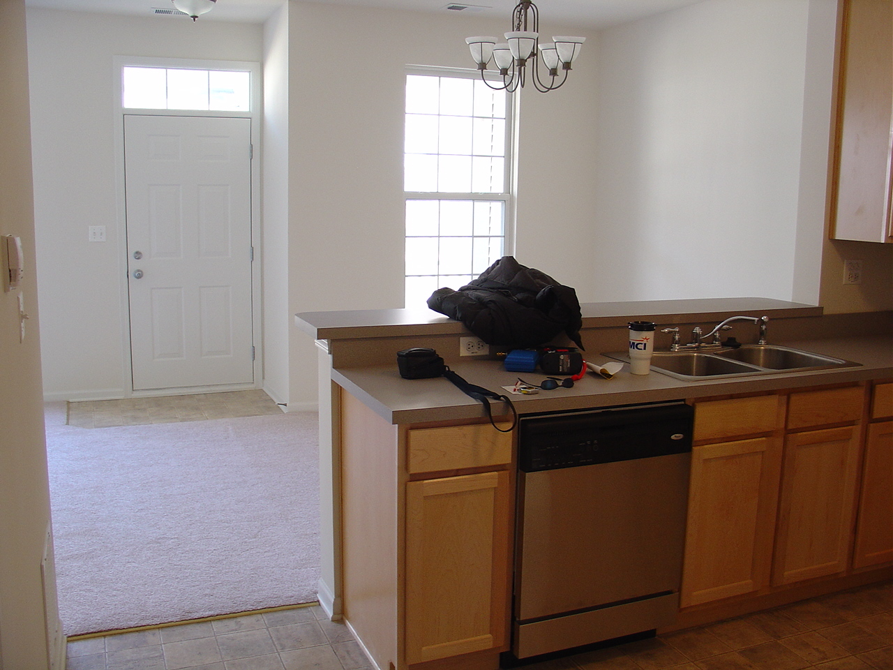 229 Springbrook Trail South Oswego, IL 60543 - Photo 4 of 10 a kitchen with a stove and a window