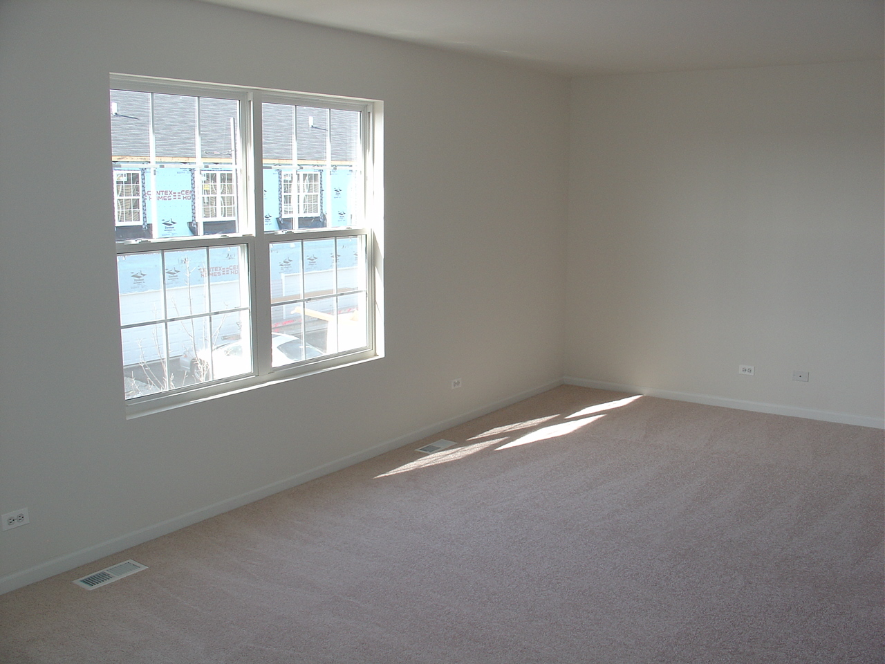 229 Springbrook Trail South Oswego, IL 60543 - Photo 7 of 10 an empty room with a window