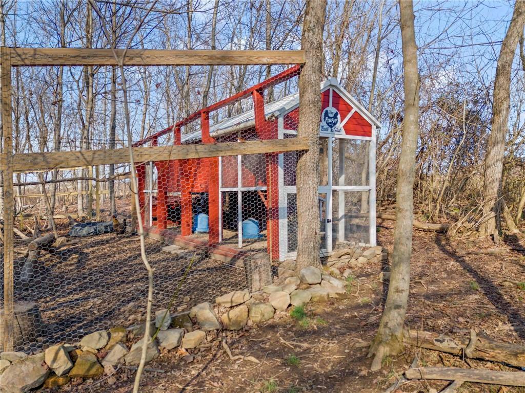 260 East Riverside Road East Millsboro, PA 15433 - Photo 32 of 40 Custom Chicken Coop and 45’x25’ secured chicken run included.