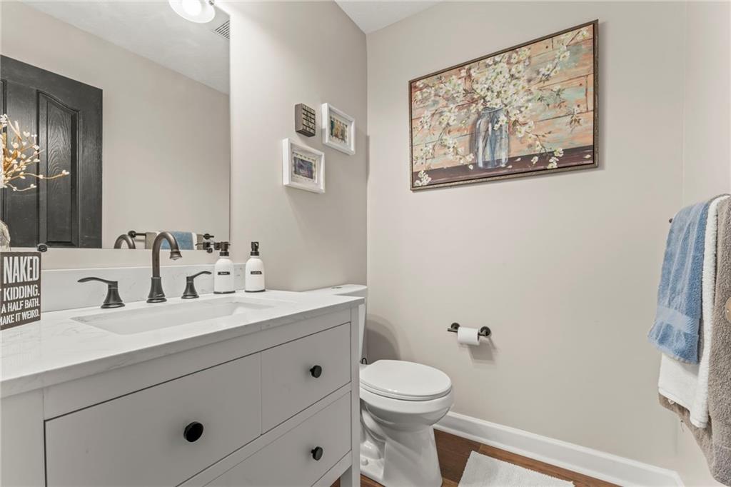 260 East Riverside Road East Millsboro, PA 15433 - Photo 8 of 40 Fully remodeled half bath on the first floor. New toilet and vanity, same convenient location!