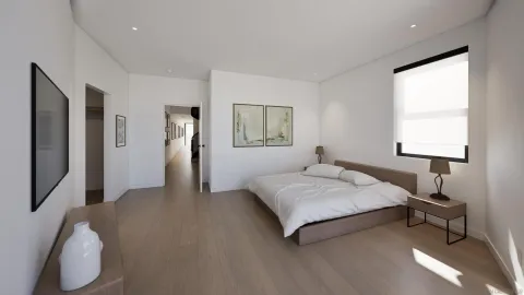 a spacious bedroom with a bed and a lamp