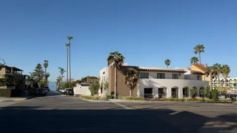 front view of a house with a street