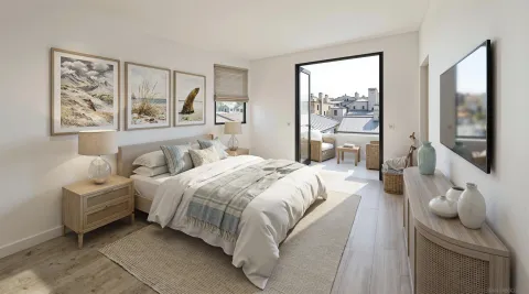 a bedroom with bed and large window