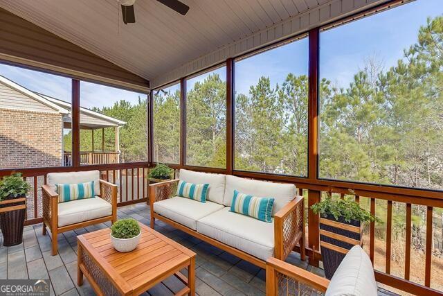 567 Lillian Way Jefferson, GA 30549 - Photo 21 of 80 a outdoor living room with furniture and a potted plant