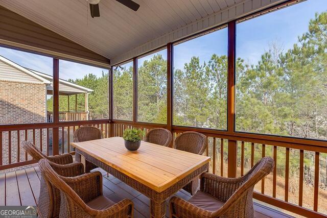 567 Lillian Way Jefferson, GA 30549 - Photo 23 of 80 a view of a dining room with furniture window and outside view