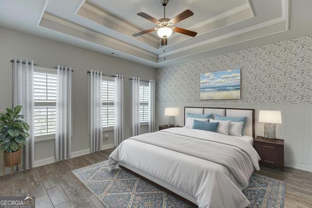 567 Lillian Way Jefferson, GA 30549 - Photo 26 of 80 a bedroom with a large bed and a chandelier