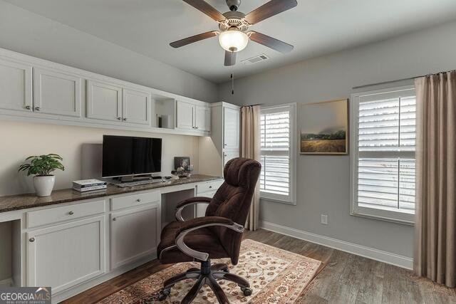 567 Lillian Way Jefferson, GA 30549 - Photo 34 of 80 a view of a workspace with furniture and a window