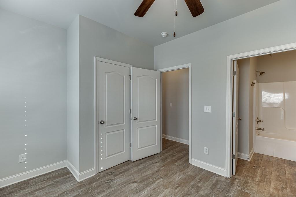 567 Lillian Way Jefferson, GA 30549 - Photo 37 of 80 wooden floor in an empty room