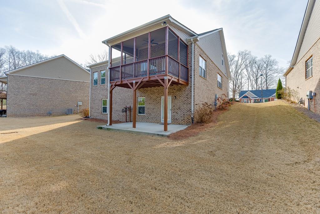 567 Lillian Way Jefferson, GA 30549 - Photo 50 of 80 a view of a house with a yard