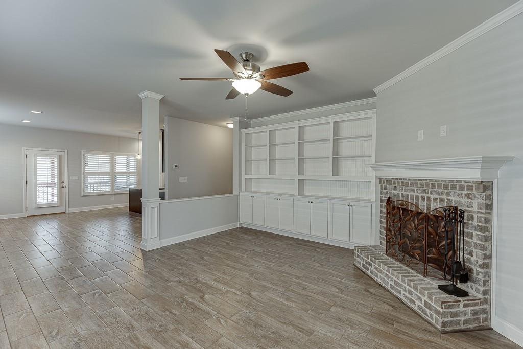 567 Lillian Way Jefferson, GA 30549 - Photo 5 of 80 a view of a livingroom with a fireplace and window