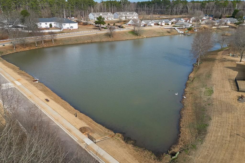 567 Lillian Way Jefferson, GA 30549 - Photo 66 of 80 a view of a lake with an outdoor space