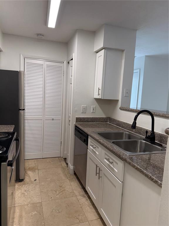 216 Afton Square, Unit 111 Altamonte Springs, FL 32714 - Photo 11 of 41 a kitchen with granite countertop a sink stove and refrigerator