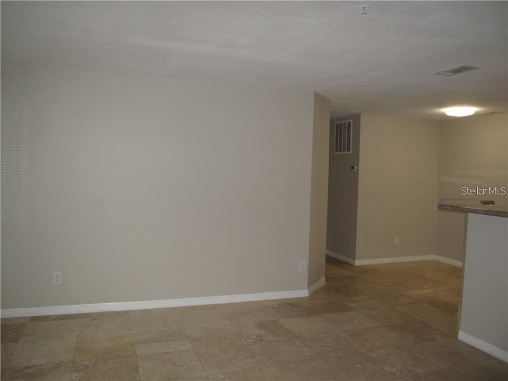 216 Afton Square, Unit 111 Altamonte Springs, FL 32714 - Photo 2 of 41 a view of an empty room