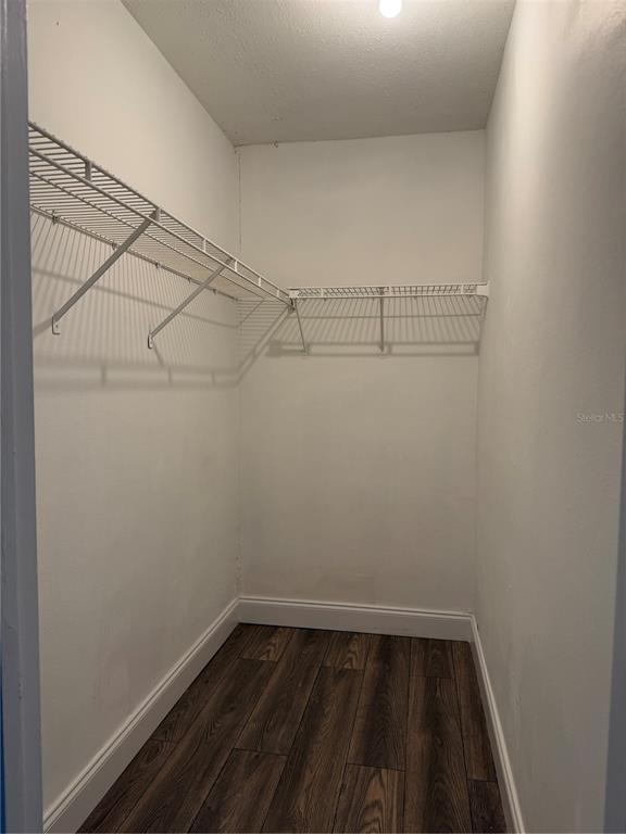 216 Afton Square, Unit 111 Altamonte Springs, FL 32714 - Photo 23 of 41 a view of a room with racks on the wall