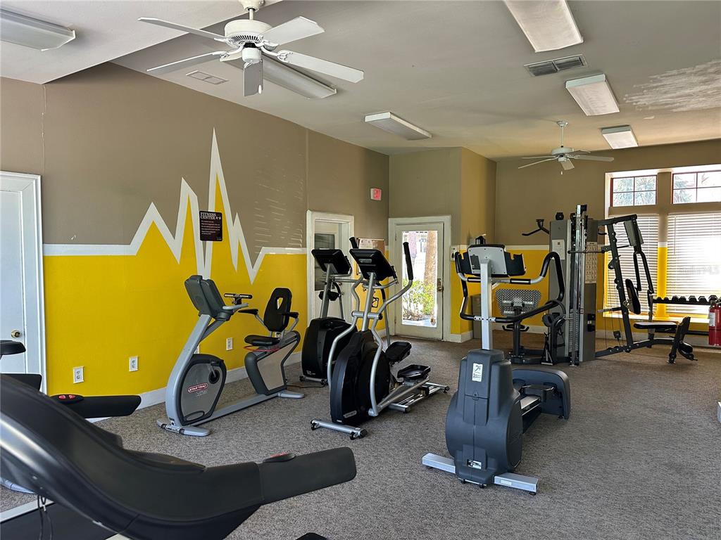 216 Afton Square, Unit 111 Altamonte Springs, FL 32714 - Photo 27 of 41 a view of a room with gym equipment