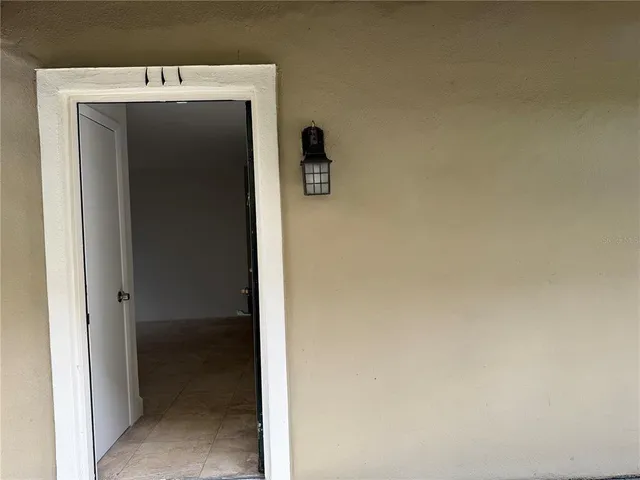 an aerial view of house with yard