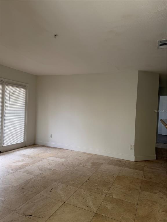 216 Afton Square, Unit 111 Altamonte Springs, FL 32714 - Photo 6 of 41 a view of an empty room