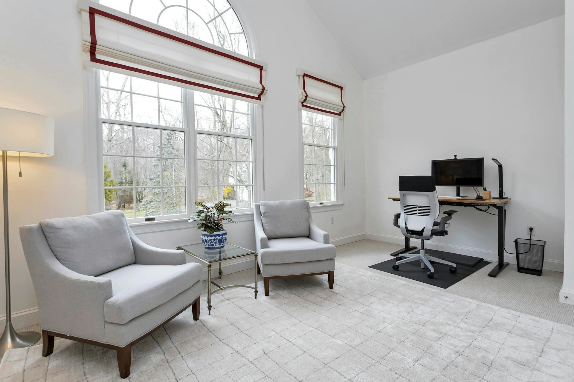 16 Meadowbrook Road Darien, CT 06820 - Photo 18 of 20 a living room with furniture a flat screen tv and a window