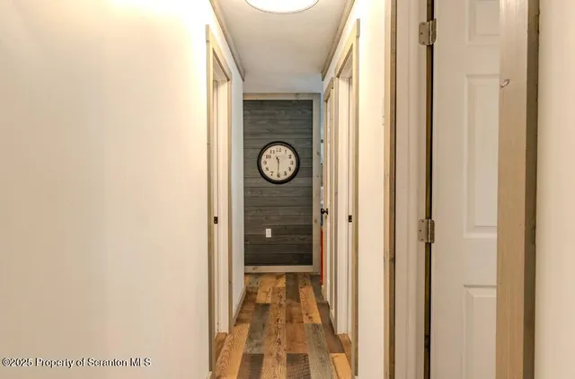a en suite bathroom with a granite countertop sink and a mirror