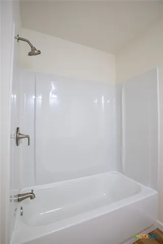 a bathroom with a bathtub