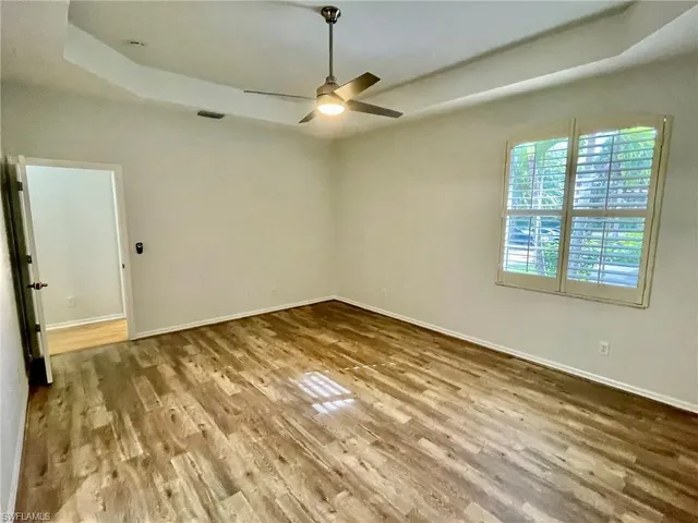 a bathroom with a shower sink and mirror