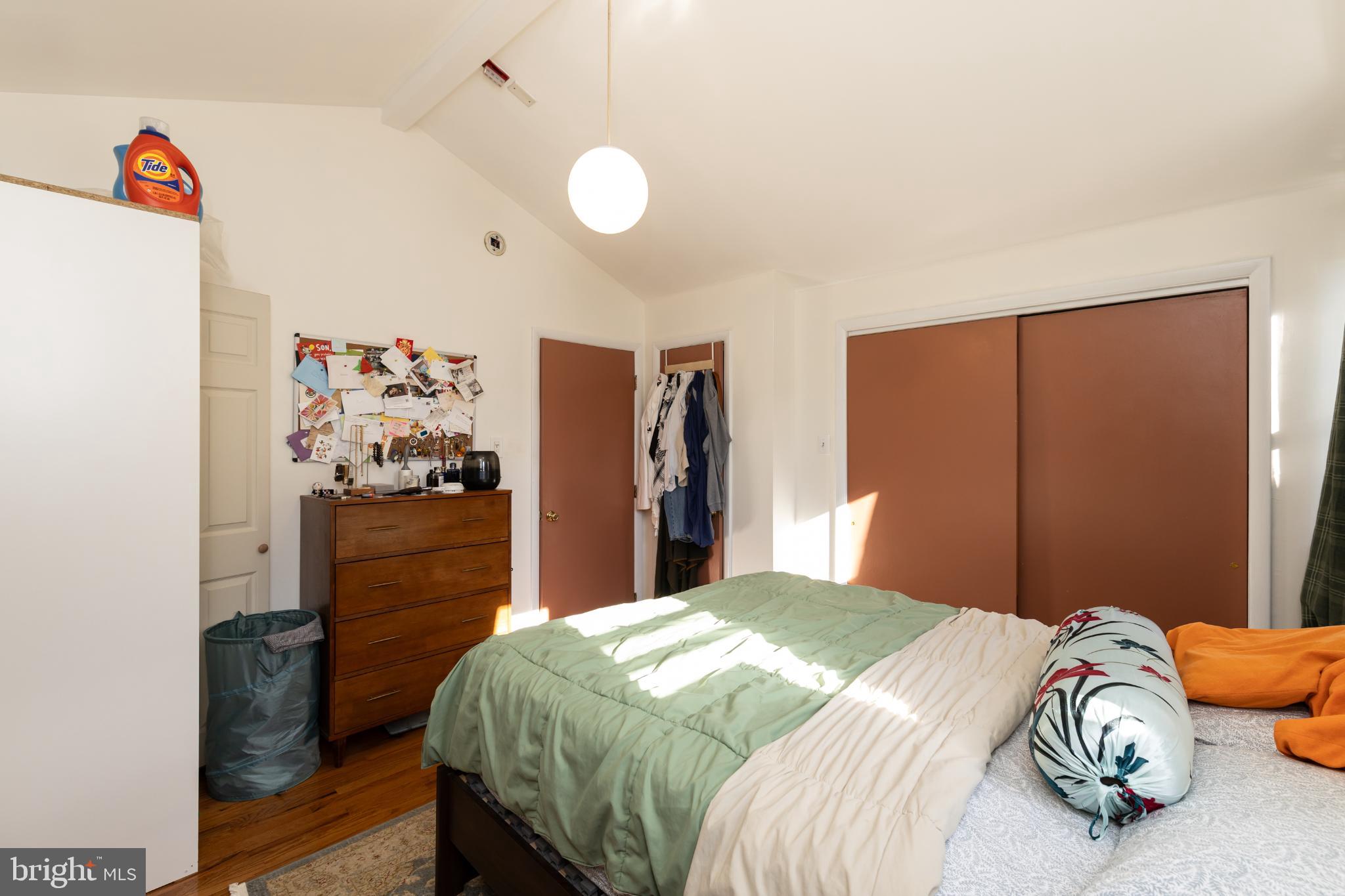 910 Mountain Street Philadelphia, PA 19148 - Photo 17 of 26 a bedroom with a bed and a dresser