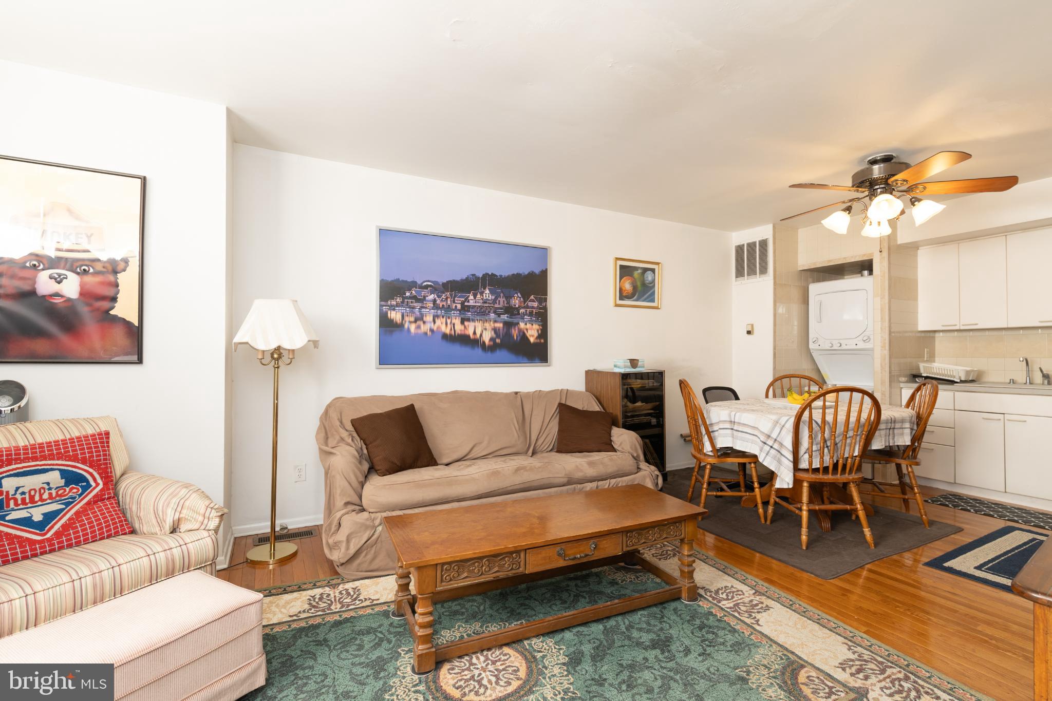910 Mountain Street Philadelphia, PA 19148 - Photo 18 of 26 a living room with furniture a rug and a table