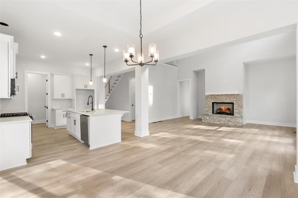 30 Rushden Way Southeast Rome, GA 30161 - Photo 11 of 58 a view of a kitchen with a sink and a refrigerator