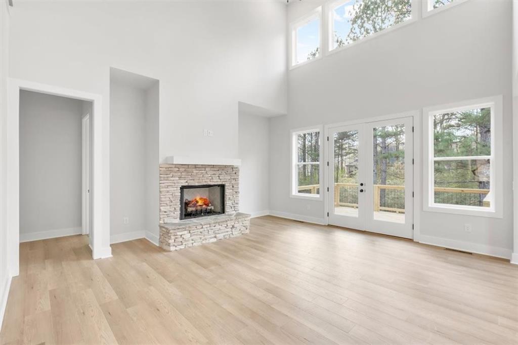 30 Rushden Way Southeast Rome, GA 30161 - Photo 14 of 58 a view of an empty room with a window and fireplace
