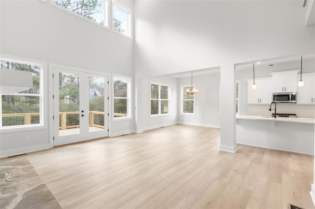 30 Rushden Way Southeast Rome, GA 30161 - Photo 15 of 58 a view of an empty room with window and wooden floor