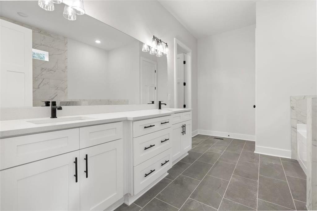 30 Rushden Way Southeast Rome, GA 30161 - Photo 26 of 58 a bathroom with a double vanity sink mirror and