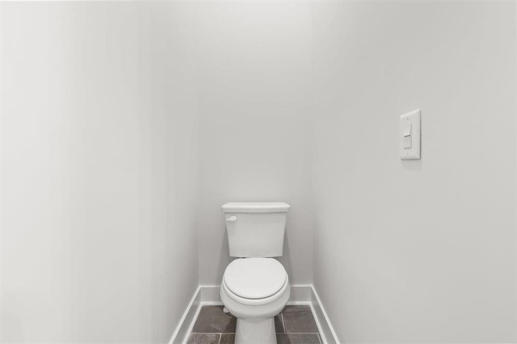 30 Rushden Way Southeast Rome, GA 30161 - Photo 39 of 58 a white toilet sitting in a bathroom