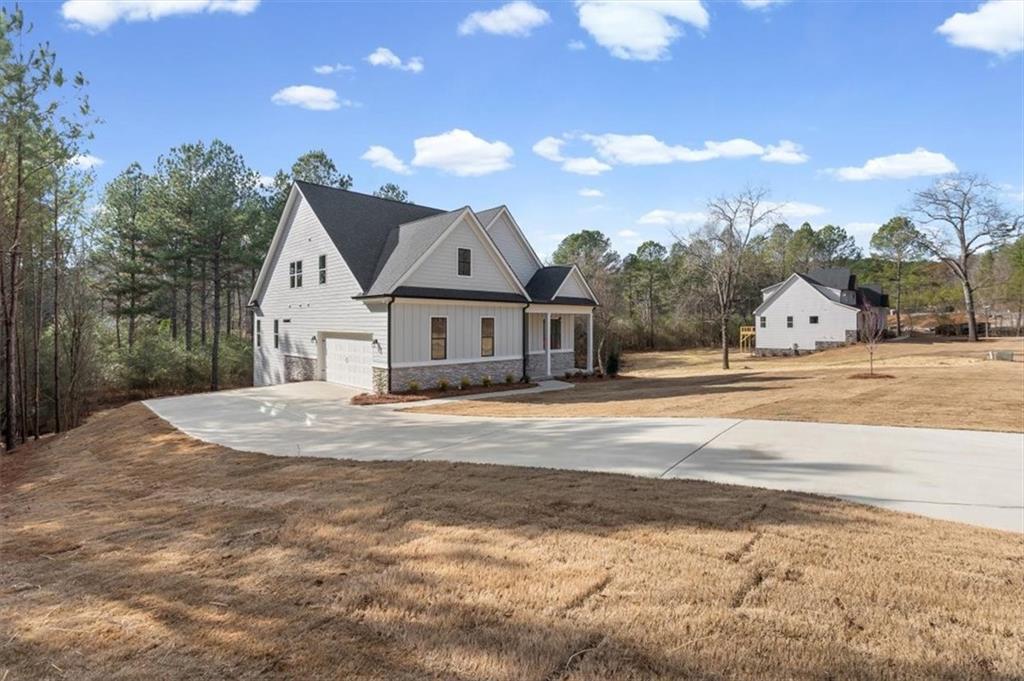 30 Rushden Way Southeast Rome, GA 30161 - Photo 4 of 58 a view of a house with a snow in the background