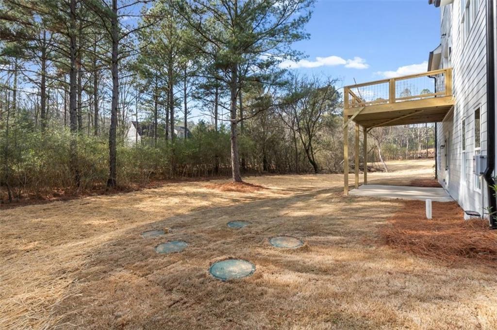 30 Rushden Way Southeast Rome, GA 30161 - Photo 46 of 58 a view of a house with a backyard
