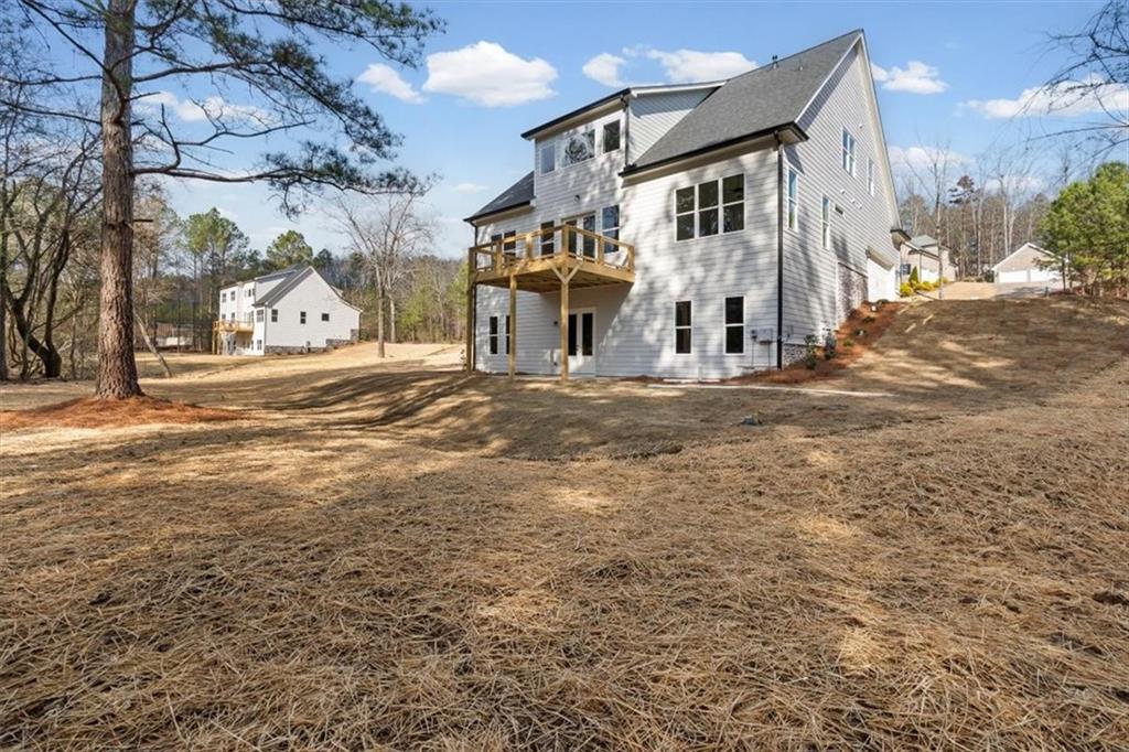 30 Rushden Way Southeast Rome, GA 30161 - Photo 47 of 58 a front view of a house with a yard