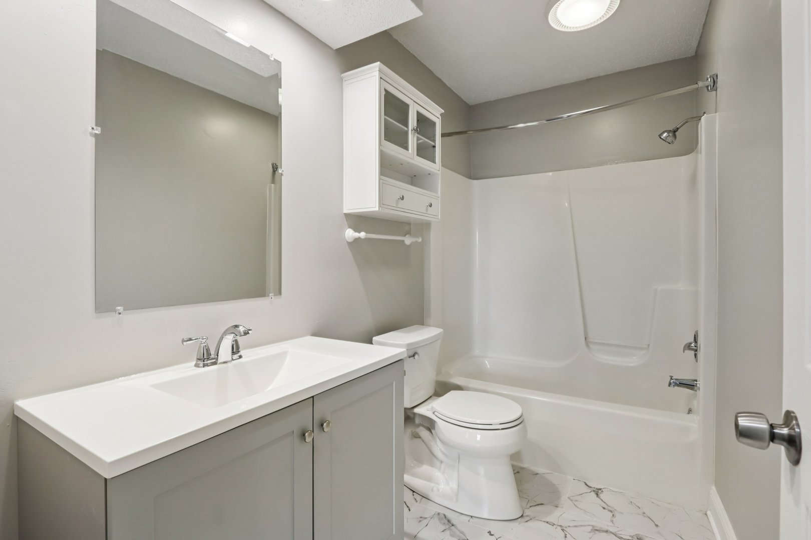 3103 Timberline Drive Champaign, IL 61822 - Photo 13 of 19 a bathroom with a sink a toilet and shower