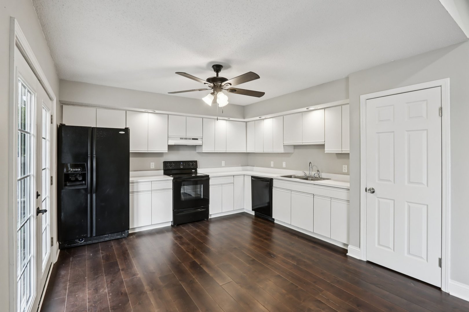 3103 Timberline Drive Champaign, IL 61822 - Photo 6 of 19 a kitchen with a refrigerator and a stove top oven