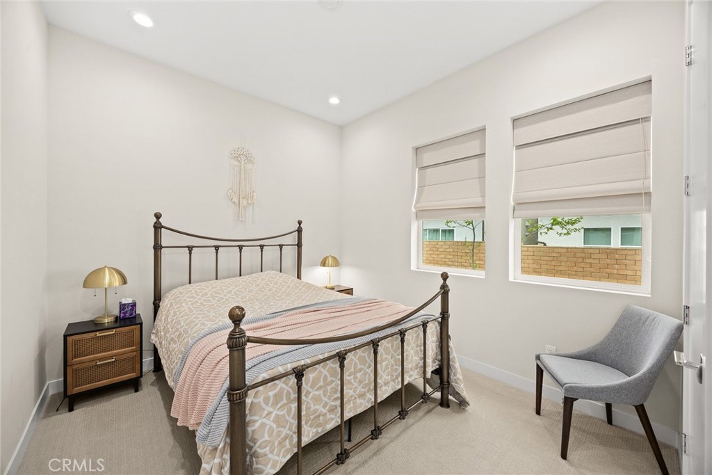 478 Sycamore Montebello, CA 90640 - Photo 20 of 67 a bedroom with a bed and a window