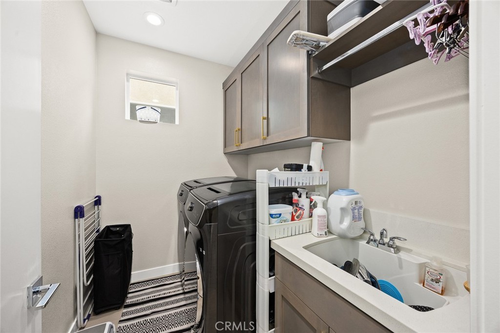 478 Sycamore Montebello, CA 90640 - Photo 22 of 67 a utility room with sink dryer and washer