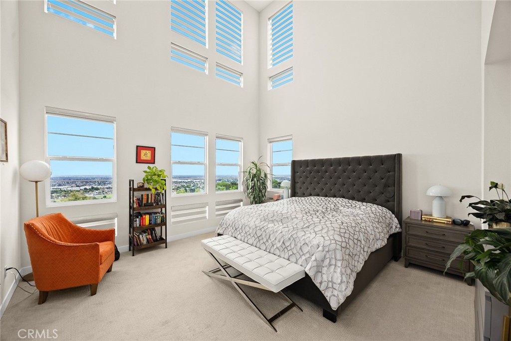 478 Sycamore Montebello, CA 90640 - Photo 26 of 67 a bedroom with a bed and lounge chair