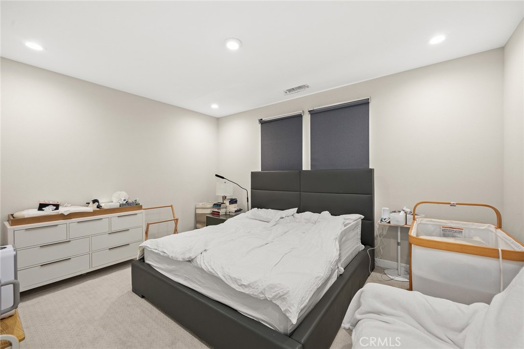 478 Sycamore Montebello, CA 90640 - Photo 36 of 67 a room with a bed and a window