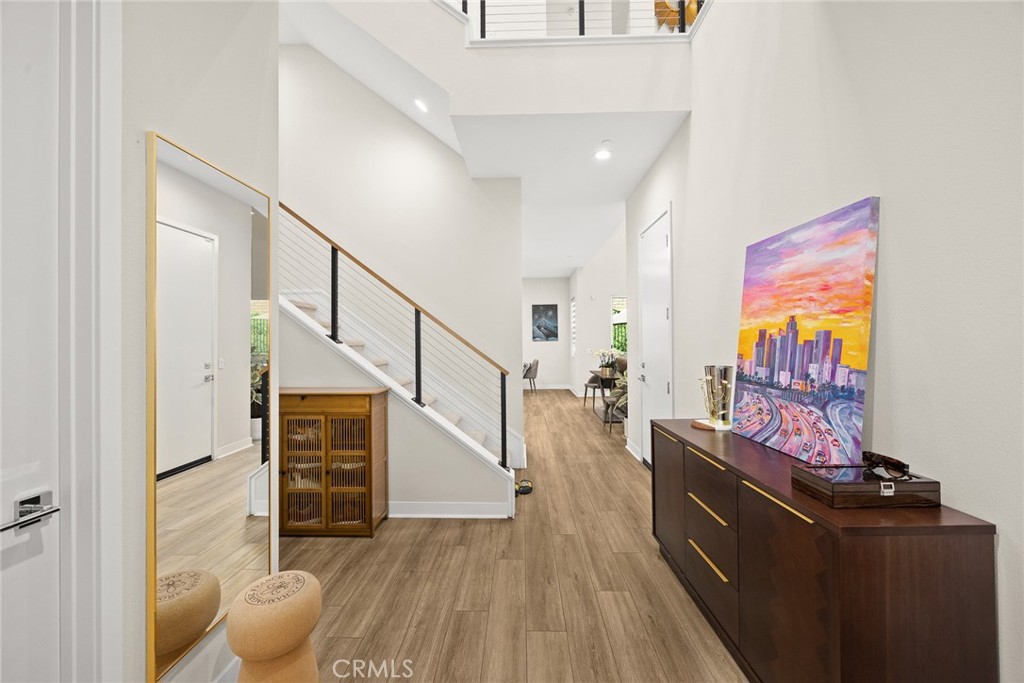478 Sycamore Montebello, CA 90640 - Photo 4 of 67 a view of entryway and hall with wooden floor