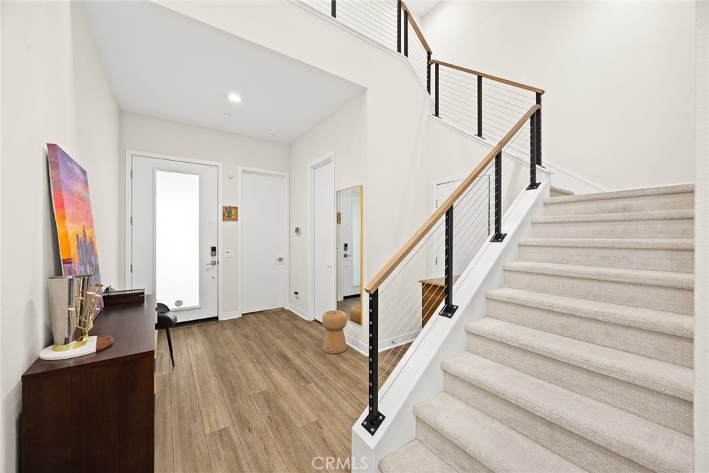 478 Sycamore Montebello, CA 90640 - Photo 5 of 67 a view of entryway with wooden floor and stairs