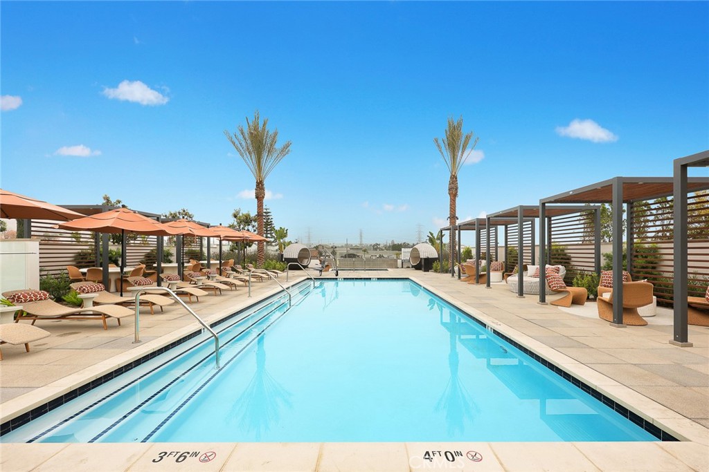 478 Sycamore Montebello, CA 90640 - Photo 53 of 67 a view of a swimming pool with a lounge chair